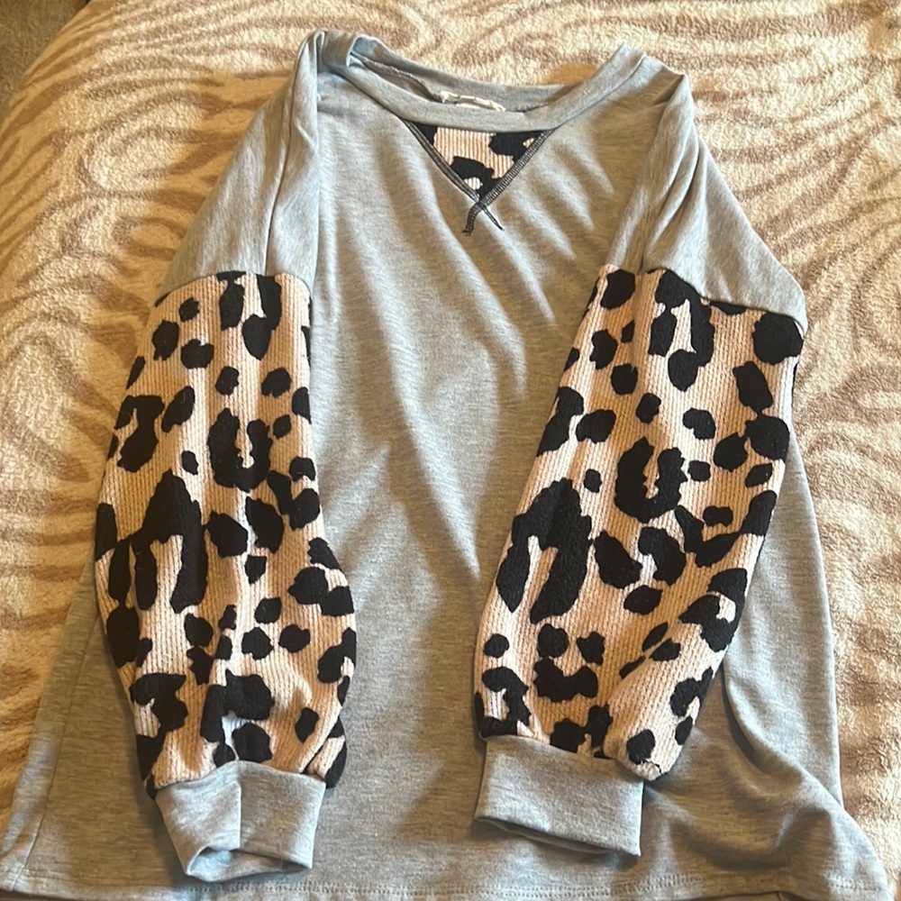 A long sleeve cheetah printed shirt